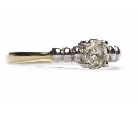 DIAMOND SOLITAIRE RINGthe oval diamond of approximately 0.42 carats on ribbed shoulders, in nine carat gold, size M