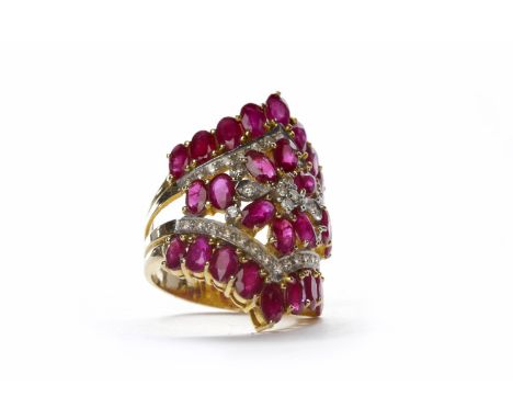 IMPRESSIVE RUBY AND DIAMOND RINGset with oval rubies and round diamonds, unmarked, size M, 9.8g