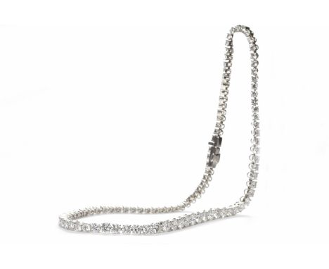 VAN CLEEF AND ARPELS PARIS PLATINUM DIAMOND RIVIERE NECKLACEformed by graduated round brilliant cut diamonds, the largest dia