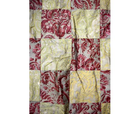 A PAIR OF ANTIQUE FORTUNY INTERLINED CURTAINS, hand blocked with a metallic finish in Carvaggio red and carnavelet gold fabri