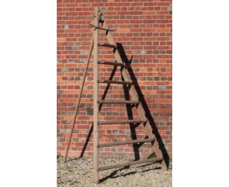 AN OLD PINE APPLE PICKING LADDER of triangular form with third leg 133cm wide x 253cm high 