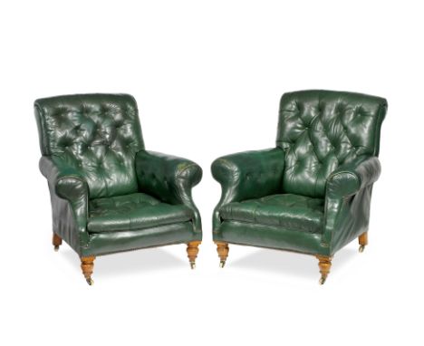 A PAIR OF VICTORIAN GREEN LEATHER BUTTON UPHOLSTERED CLUB ARMCHAIRS with scrolling arms and turned tapering oak front legs te