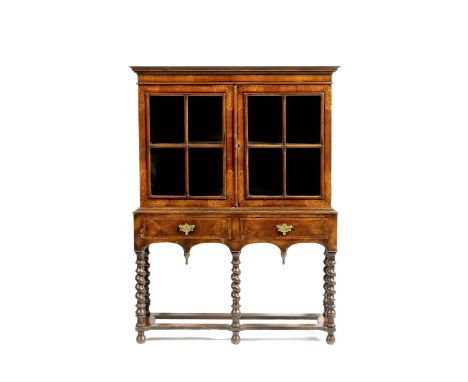 AN 18TH CENTURY STYLE WALNUT CUPBOARD ON STAND, the twin glazed doors above enclosing a single shelf and with marquetry inlai