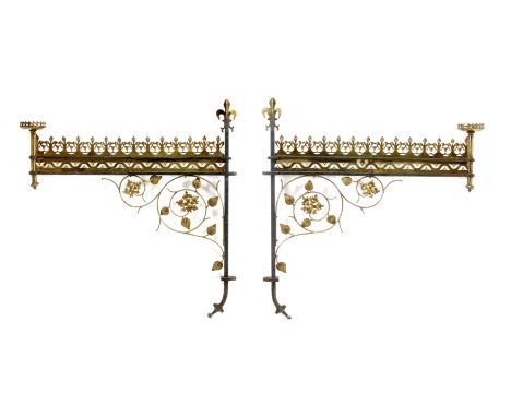 A PAIR OF VICTORIAN WROUGHT IRON and wrought brass architectural lamp brackets with pierced fleur de lys cresting and scrolli