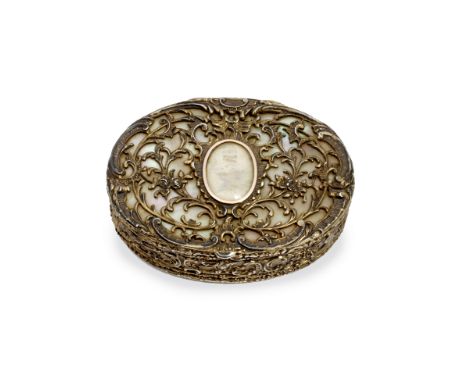 A CONTINENTAL SILVER AND MOTHER OF PEARL SNUFF BOX with scrolling floral decoration, lifting lid with an inset locket opening