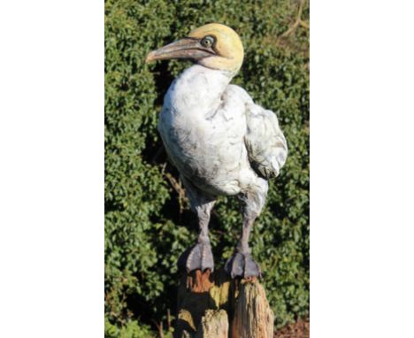 DAVID COOKE (b.1970) 'GANNET' STONEWARE mounted on a wooden post and stone plinth base, signed with initials D.C. and dated 2