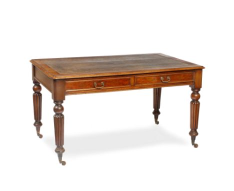 A WILLIAM IV MAHOGANY LIBRARY TABLE with leather inset top, having two frieze drawers on turned and lobed legs and ceramic ca