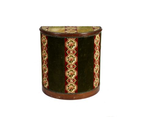 A 19TH CENTURY FRENCH MAHOGANY FRAMED HALF ROUND CARPET UPHOLSTERED LAUNDRY BOX, decorated with foliate bands on a green grou