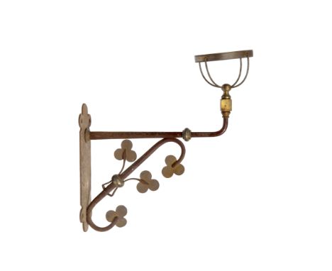 A VICTORIAN GOTHIC REVIVAL PAINTED WROUGHT IRON OIL LAMP BRACKET, the support with stylised trefoil leaves, the wall plate 31
