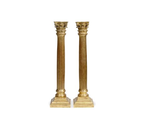A PAIR OF VENETIAN GILT CARVED WOOD TABLE LAMP BASES in the form of fluted Corinthian columns standing on square stepped base