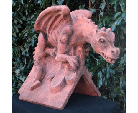 A ROOF RIDGE TILE FINIAL of a dragon preparing to fly 43cm high