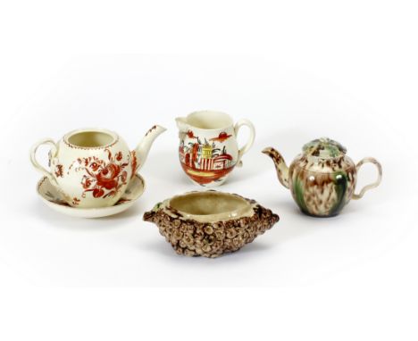 A LATE 18TH /EARLY 19TH CENTURY CREAMWARE MINIATURE GLOBULAR TEA POT decorated in iron red with flowers 8cm high (lid lacking