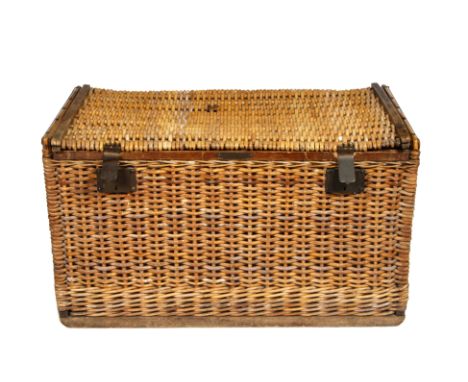 A LARGE FRENCH WICKER HAMPER with metal side carrying handles and clasps, and plaque embossed 'Systéme Bréveté', 105cm wide