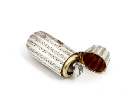 AN EARLY VICTORIAN SILVER MINIATURE SCENT BOTTLE of reeded cylindrical form, a gilt lining and marks for Birmingham 1840, 6.5