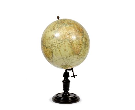 AN OLD FRENCH TERRESTRIAL GLOBE by J. Lebegue & Co. of Paris, on a turned wooden support and circular turned base with inset 