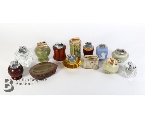 Two trays of vintage table lighters, including Ronson, Colibri, Piezo agate examples, Dunhill, Minton fine bone china example