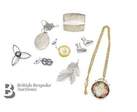 Miscellaneous jewellery, including a sterling silver and enamel pansy brooch 25mm; a stylistic leaf brooch stamped Ecco 60 x 