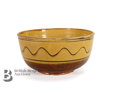 Patrick Groom (active 1947-1954) for Winchcombe Pottery, large slipware bowl, ochre and brown glaze with brown trailing, appr