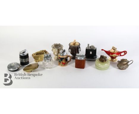 Two trays of vintage table lighters, including Ronson, Colibri, Mosda Period, Wedgwood and turned wood examples, approx 40.&n