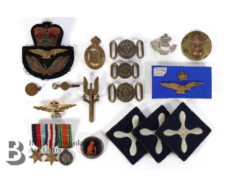 Collection of GB Regimental and RAF cap badges, medallions, buttons and pips including Who Dares Wins cap badge, Royal Artill