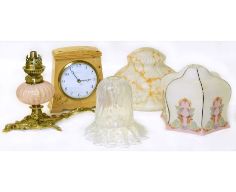 Art Nouveau oil lamp, three shades and a Maple mantle clock. We are unable to do condition reports for this sale.