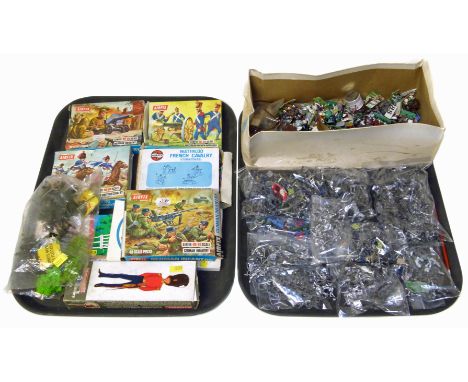 A large quantity of un-painted lead soldiers, 5 boxes of Airfix soldiers and fencing gate, military uniforms book and Humbrol