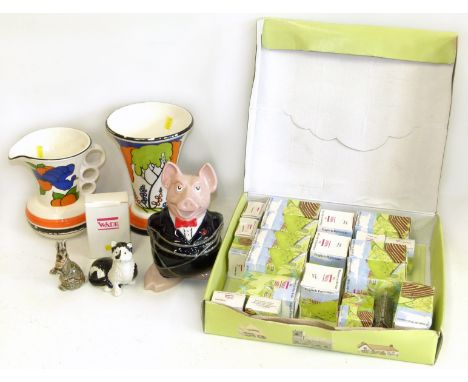 A collection of Wade including a Chained Father piggy bank, two prototype Clarice Cliff by Wade models, collectors club cat, 