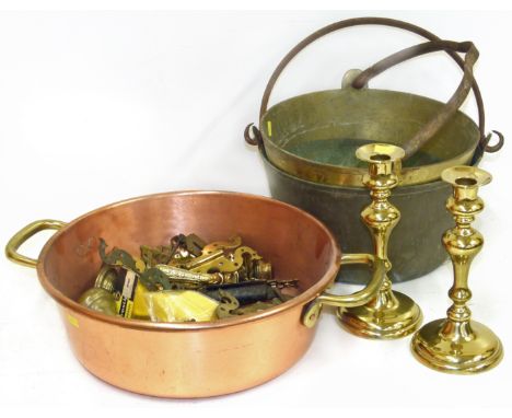 Quantity of reproduction brass hinges, pair of brass candlesticks, two handled copper pan, two brass jam kettles and two pock