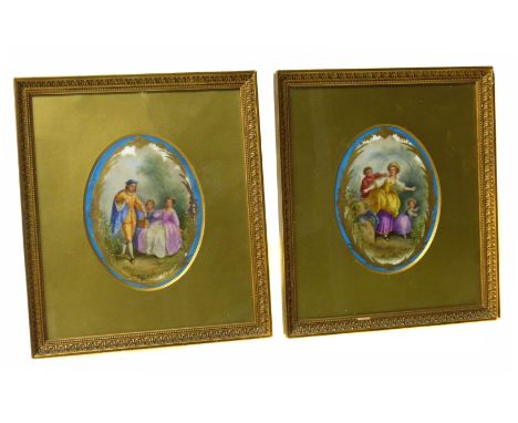 Pair of Sevres style ceramic hand-painted oval plaques (2). We are unable to do condition reports for this sale.