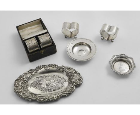 A PAIR OF EDWARDIAN HEART-SHAPED NAPKIN RINGS with engraving &amp; scroll feet, by W.H. Leather, Birmingham 18902, a cased pa