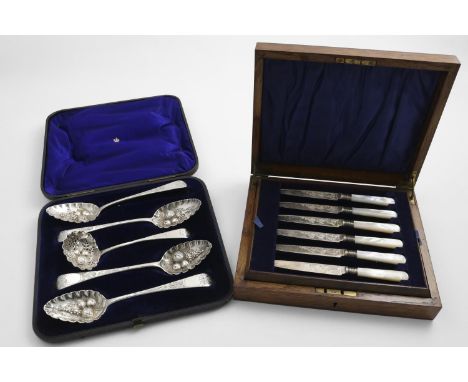 A GEORGE V CASED SET OF SIX ENGRAVED FRUIT OR DESSERT KNIVES AND SIX FORKS with mother-of-pearl handles, maker's mark "GB&amp