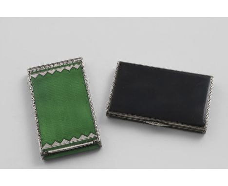 A CONTINENTAL ART DECO LADY'S CIGARETTE CASE decorated in emerald green enamel over an engine-turned ground, gilt interior wi