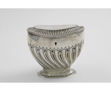 A VICTORIAN TEA CADDY oval with swirl fluting around the lower body and reeded decoration around the cover &amp; foot, with l