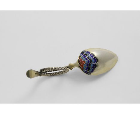 A LATE 19TH / EARLY 20TH CENTURY NORWEGIAN SILVERGILT CADDY SPOON with a coiled, twist stem, decorated on the back of the bow