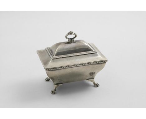 AN EDWARDIAN TEA CADDY on four paw feet with a domed cover, gadrooned borders &amp; gilt interior, by Messrs. Barnard, London