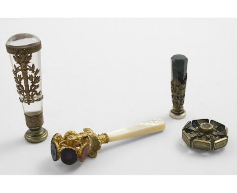 A VICTORIAN MOTHER-OF- PEARL HANDLED, GILT METAL REVOLVING SEAL with hardstone matrixes and sentimental messages intaglio, to