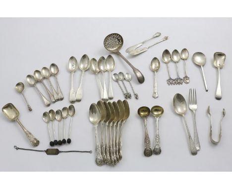 A MIXED LOT:- Seven antique King's pattern tea spoons, a sugar spoon and two salt spoons, all crested to match, a set of four