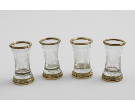 A SET OF FOUR LATE 19TH CENTURY FRENCH SILVERGILT-MOUNTED GLASS SHOT GLASS with waisted bodies decorated with wheel-cut ammat