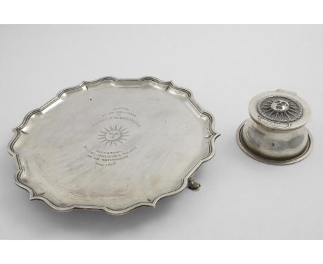 A GEORGE V CAPSTAN INKWELL  with the emblem of the Sun Alliance Assurance Society in relief on the cover, (cut-glass liner), 