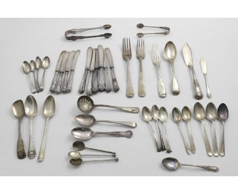 A MIXED LOT:- Two pairs of sugar tongs, three forks, two butter knives, a sugar spoon, three dessert spoons, a sugar sifter l