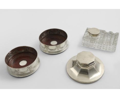 A PAIR OF CONTEMPORARY WINE COASTERS with turned wooden bases, and drapey festoons and tied ribbons around the sides in relie