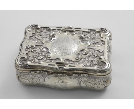 A LARGE EARLY VICTORIAN PRESENTATION SNUFF BOX of rectangular serpentine outline, with engraved convex sides, with the arms o