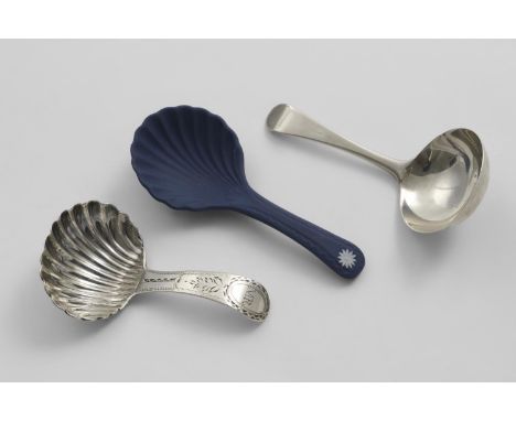 A GEORGE III OLD ENGLISH PATTERN CADDY SPOON by Richard Crossley, London 1785, another with a fluted bowl and engraved stem, 