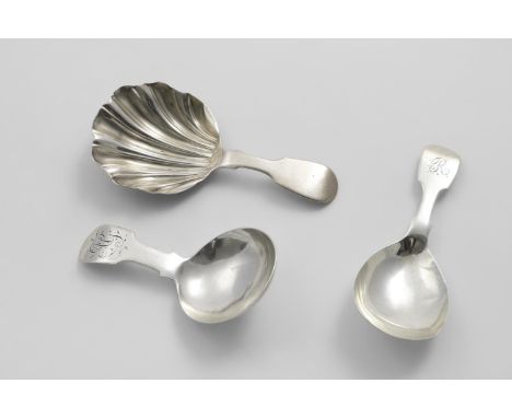 AN EARLY PROVINCIAL FIDDLE PATTERN CADDY SPOON with a plain circular bowl, initialled "AG", by Patrick Leonard of Salford, Ma