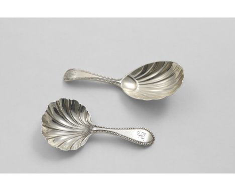A VICTORIAN BEAD PATTERN CADDY SPOON with a scallop shell bowl, initialled "P", by R. Martin &amp; E. Hall, Sheffield 1866 an