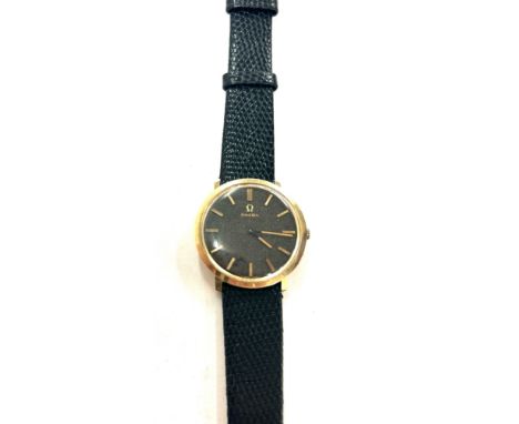 Gents vintage 9ct gold Omega wristwatch, working order, however no warranty given