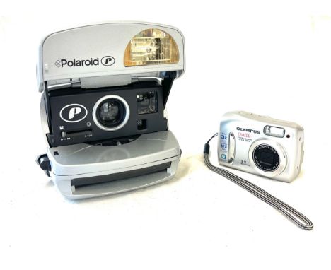 A vintage Polaroid P 600 film camera grey and a Olympus camedia camera- untested