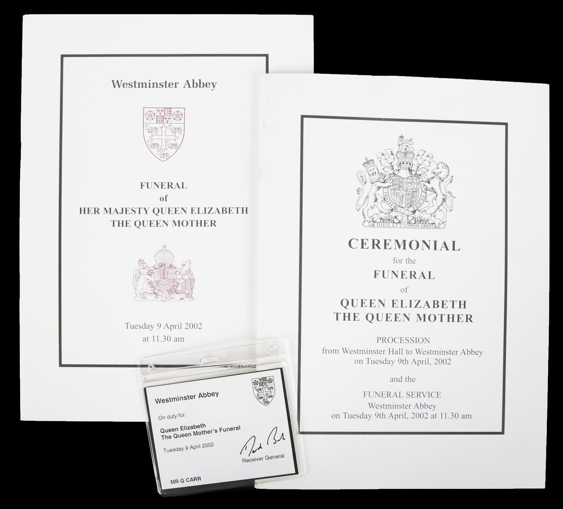 A pair of booklets from the funeral service of Her Majesty Queen