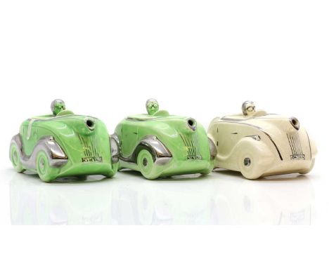 A group of three James Sadler 'Racing Car' pottery teapots,  1930s, comprising two green and one pale example, each with silv