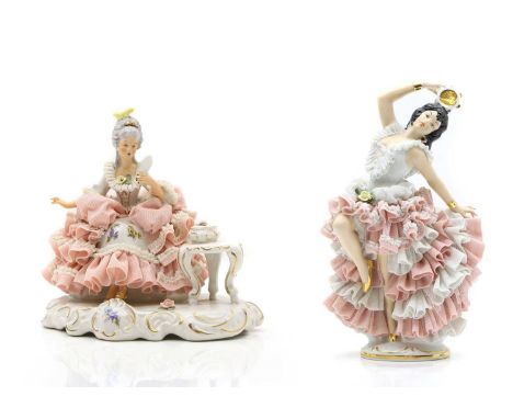 Dresden porcelain figures,  20th century, German, modelled as a dancing woman with a tambourine, decorated in polychrome with